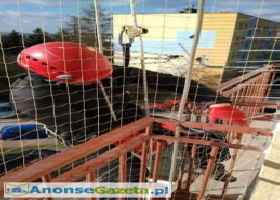Montaż siatki zabezpieczającej balkon przed wypadnięciem kotae